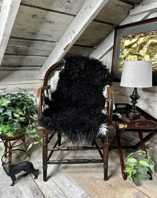 All Natural Ebony Black Sheepskin with White Trim
